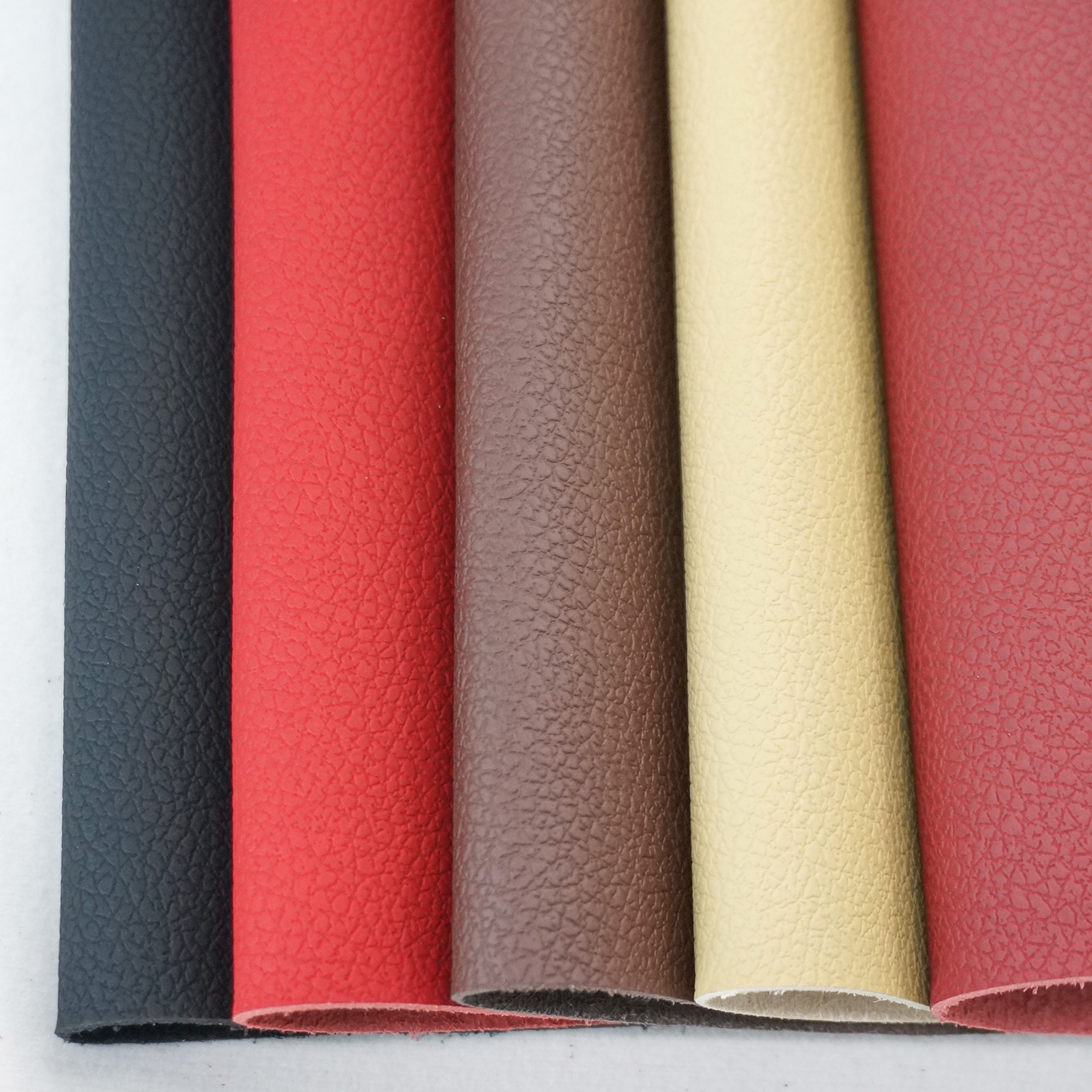 1. The microfiber leather have very good hand feel & comfortable touch, same as real leather.

2. Lighter weight than real leather. Microfiber Leather for Car Seat Cover is usually 500gsm – 700gsm.

3. Better performance than real leather. Tensile strenght, break strength, tear strength, peeling strength, abrasion resistance, hydrolysis resistance all beyond real leather.

4. Texture & Color can be customized, fashion pattern.

5. Easy to clean.

6. Can up to 100% usage rate!